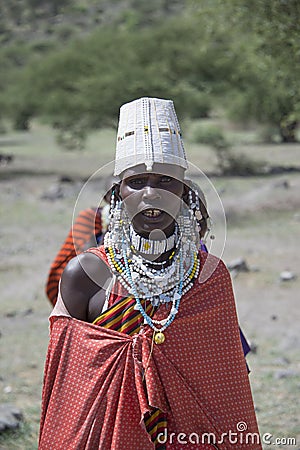 Tanzania, Africa â€“ 30 January 2016: A Maasai woman matriarch with intricate ceremonial bib-like beaded necklace jewelry Editorial Stock Photo